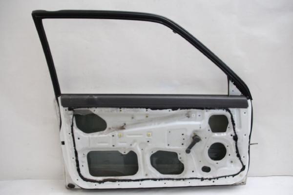 Tür 3trg links DA1459020E Mazda 121 1 DA