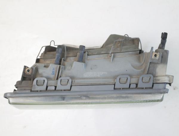 Scheinwerfer links 1370950011 Mercedes 190 W201