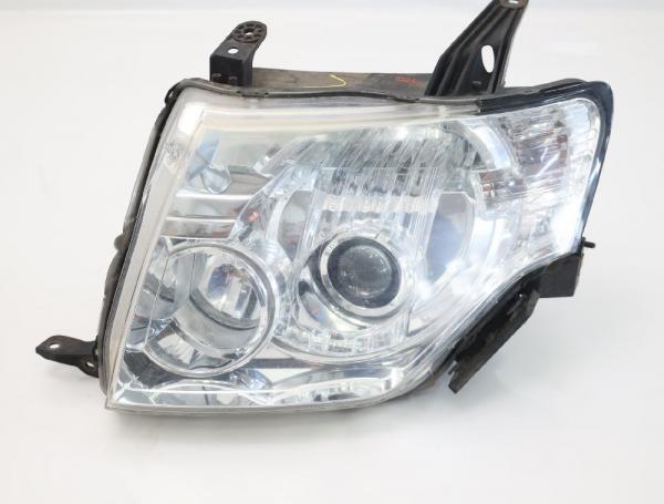 Scheinwerfer links 8301A893 Mitsubishi PAJERO 4 V98